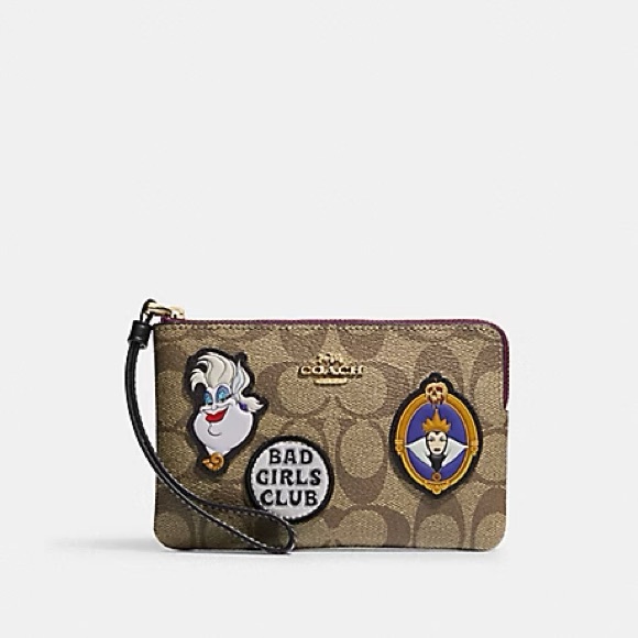 DISNEY X COACH CORNER ZIP WRISTLET IN SIGNATURE CANVAS WITH PATCHES - Picture 1 of 2